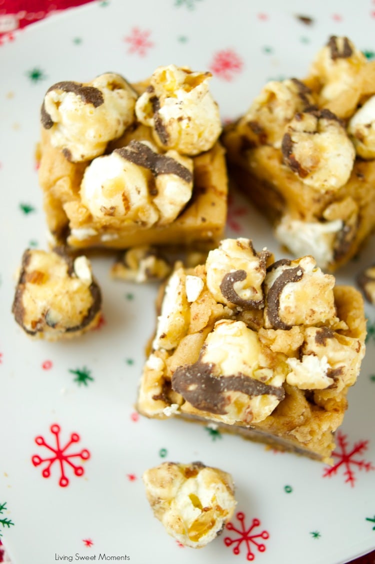 These delicious popcorn bars has a chewy peanut butter cookie crust and is topped with salted caramel fudge popcorn. The perfect dessert for kids & parties
