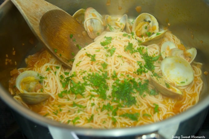 This Pasta With Clams And Scallops is ready in 30 minutes or less! The perfect quick & flavorful dinner idea for your family and friends. Loaded with flavor