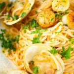 This Pasta With Clams And Scallops is ready in 30 minutes or less! The perfect quick & flavorful dinner idea for your family and friends. Loaded with flavor