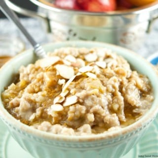 This delicious Slow Cooker Apple Oatmeal cooks overnight. It's vegan, healthy and full of flavor. Wake up to a hot bowl of apple pie oatmeal full of spice.