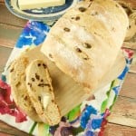 This sweet crispy Cinnamon Raisin Artisan Bread is easy to make and delicious! Enjoy a toasted slice with butter and jam for breakfast. My fave bread recipe