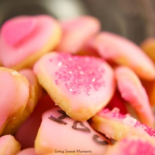 These delicious mini valentine's cookies are made from scratch and topped with a sweet glaze. The perfect DIY valentine's gift idea for kids and adults.