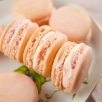 Delicious strawberry macarons that are easy to make and kid friendly. The perfect crunchy cookie filled with strawberry buttercream. My fave french dessert.