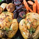 Delicious and juicy oven roasted cornish hens recipe with baked Veggies. The perfect fancy dinner idea to serve on Easter or any other Holiday. My favorite!