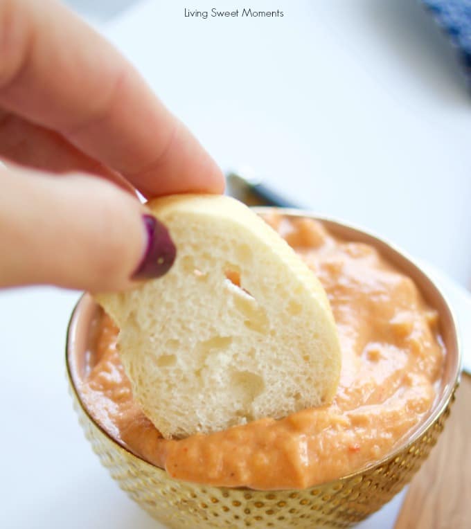 This delicious roasted red pepper Baba Ghanoush recipe is made with roasted eggplants and peppers. Makes a savory and smoky spread for bread, pitas, etc.