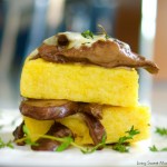 Delicious cheesy mushroom ragu served over polenta squares. A quick and easy vegetarian entree or appetizer idea. Sophisticated taste without the fuss!