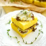 Delicious cheesy mushroom ragu served over polenta squares. A quick and easy vegetarian entree or appetizer idea. Sophisticated taste without the fuss!