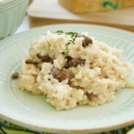 This Easy Mushroom Risotto is made in the pressure cooker so it's ready in no time! Only requires a few ingredients to make this creamy and tasty vegetarian dish