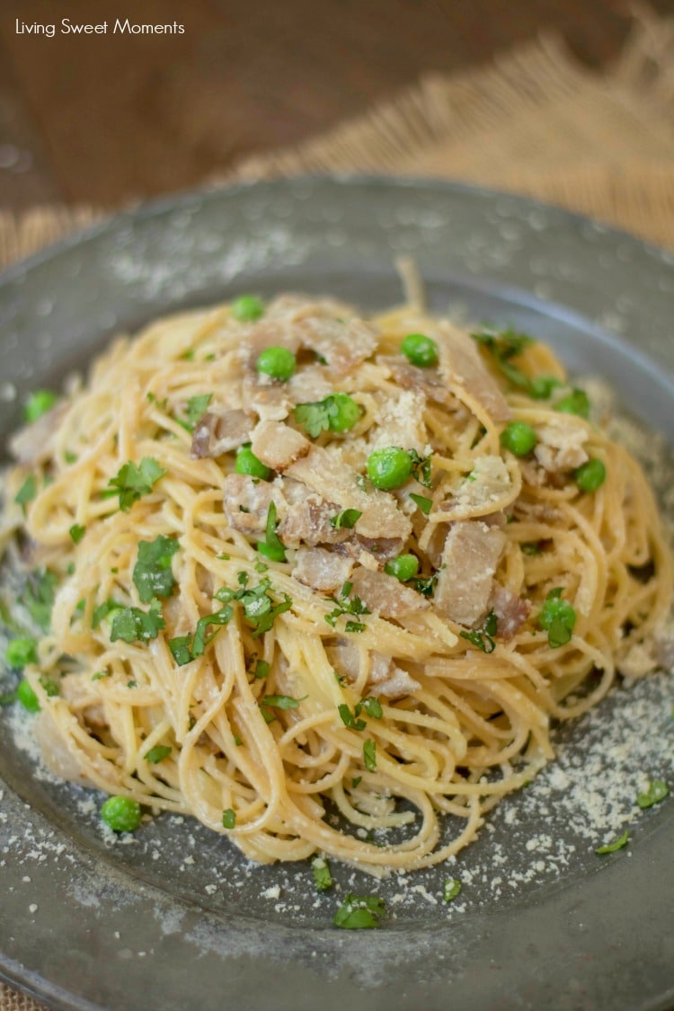 This delicious Spaghetti Carbonara Recipe made with peas, is easy to make and is ready in 20 minutes or less. The perfect quick weeknight dinner idea. 