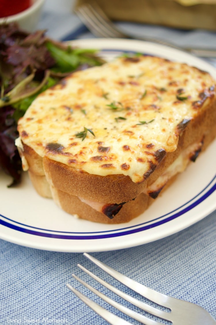 These Croque Monsieur Baked sandwiches are filled ham and cheese and topped with bechamel sauce and gruyere cheese. An easy recipe for dinner or brunch.