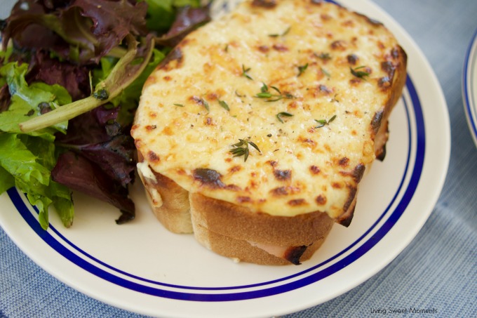 These Croque Monsieur Baked sandwiches are filled ham and cheese and topped with bechamel sauce and gruyere cheese. An easy recipe for dinner or brunch.