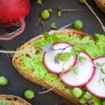 This delicious Pea Hummus Crostini recipe is easy and perfect for a Spring appetizer. Made with mint and tahini that gives a unique flavor. Vegan as well