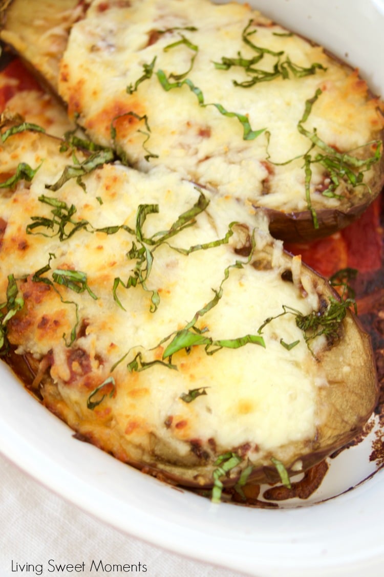 This delicious Cheesy Stuffed Eggplant Recipe is easy to make, vegetarian and very cheesy. The eggplant is roasted for extra flavor. Perfect as a side dish.