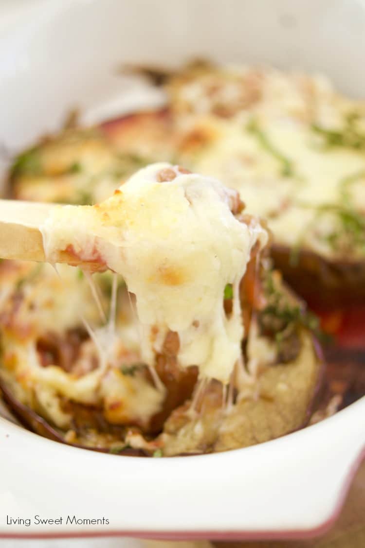 This delicious Cheesy Stuffed Eggplant Recipe is easy to make, vegetarian and very cheesy. The eggplant is roasted for extra flavor. Perfect as a side dish. 