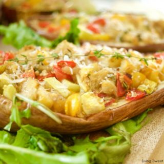 This delicious Tomato Stuffed Roasted Eggplant is super easy to make and the perfect vegetarian entree that is filling and tasty. Great for parties as well!