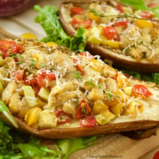 This delicious Tomato Stuffed Roasted Eggplant is super easy to make and the perfect vegetarian entree that is filling and tasty. Great for parties as well!