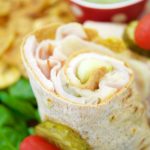 This delicious Cuban Sandwich Wrap made with turkey, is ready in 5 minutes or less and is the perfect quick weeknight dinner that is both exotic and tasty!