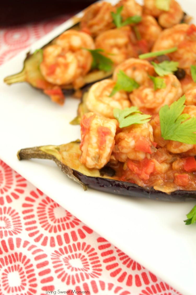 This delicious Shrimp Stuffed Eggplant Recipe is easy to make and is perfect for a nice weeknight dinner idea. The filling is inspired by Italian Caponata