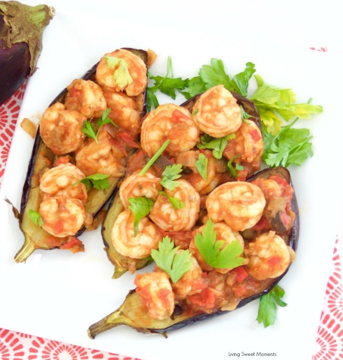 This delicious Shrimp Stuffed Eggplant Recipe is easy to make and is perfect for a nice weeknight dinner idea. The filling is inspired by Italian Caponata