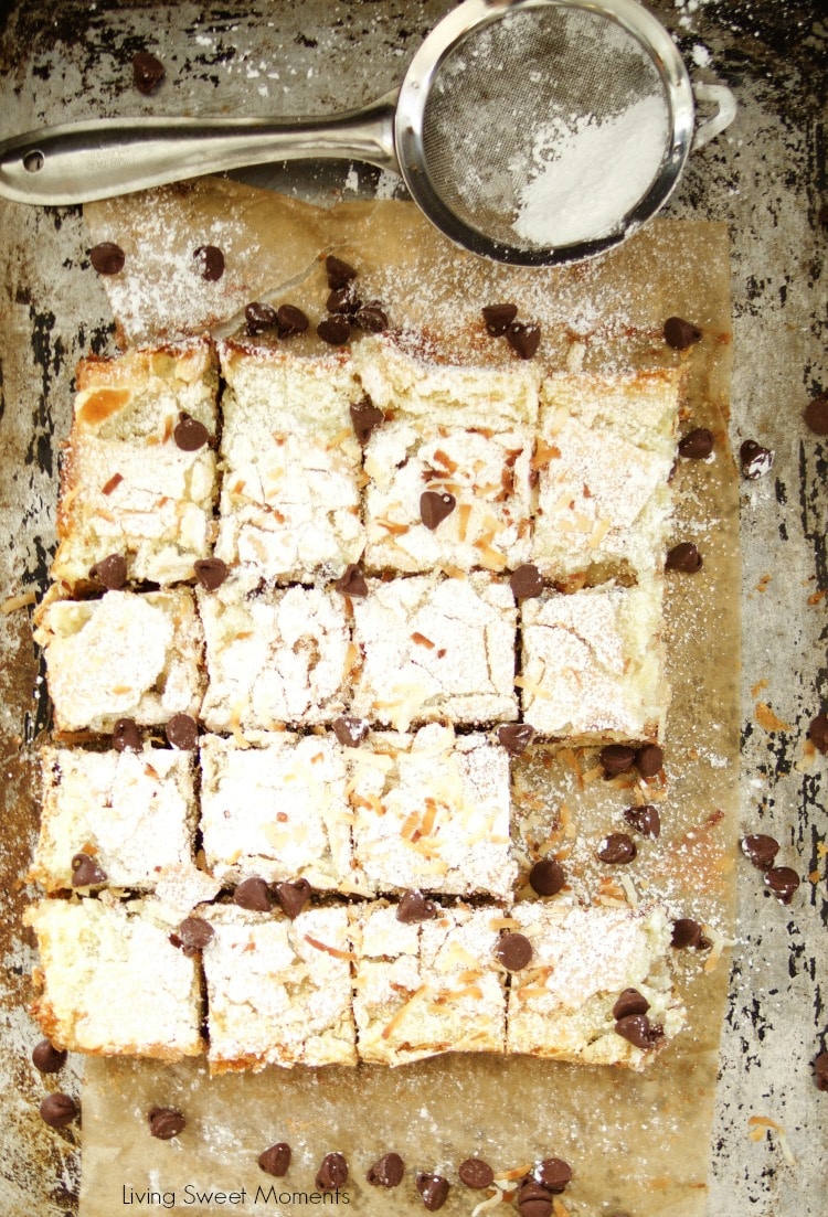 This delicious St. Louis Gooey Butter Cake Recipe is easy to make and has chocolate and coconut in the middle for extra flavor. The perfect summer dessert! 