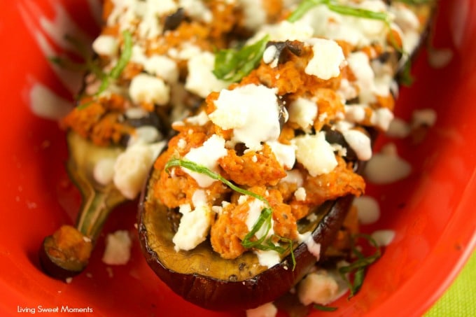 This tasty Greek Stuffed Eggplant is made with meat, kalamata olives and topped with feta cheese and tzatziki sauce. The perfect quick weeknight dinner idea
