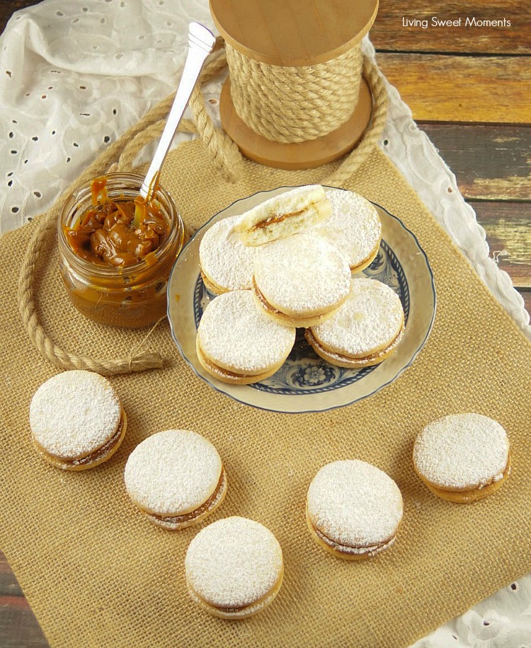 Alfajores Recipe - they are delicate shortbread cookies filled with dulce de leche. These cookies use cornstarch as a main ingredient. Great with coffee!