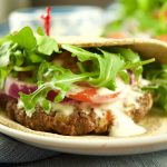 These delicious Greek Burgers With Tzatziki Sauce are made from scratch and they are ready in 20 minutes or less! The perfect quick weeknight dinner idea.