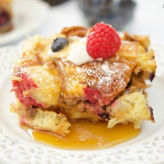 This delicious Overnight French Toast Casserole recipe is stuffed with maple peanut butter and berries. Perfect for brunch, breakfast, or even dessert. Yum!