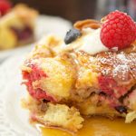 This delicious Overnight French Toast Casserole recipe is stuffed with maple peanut butter and berries. Perfect for brunch, breakfast, or even dessert. Yum!