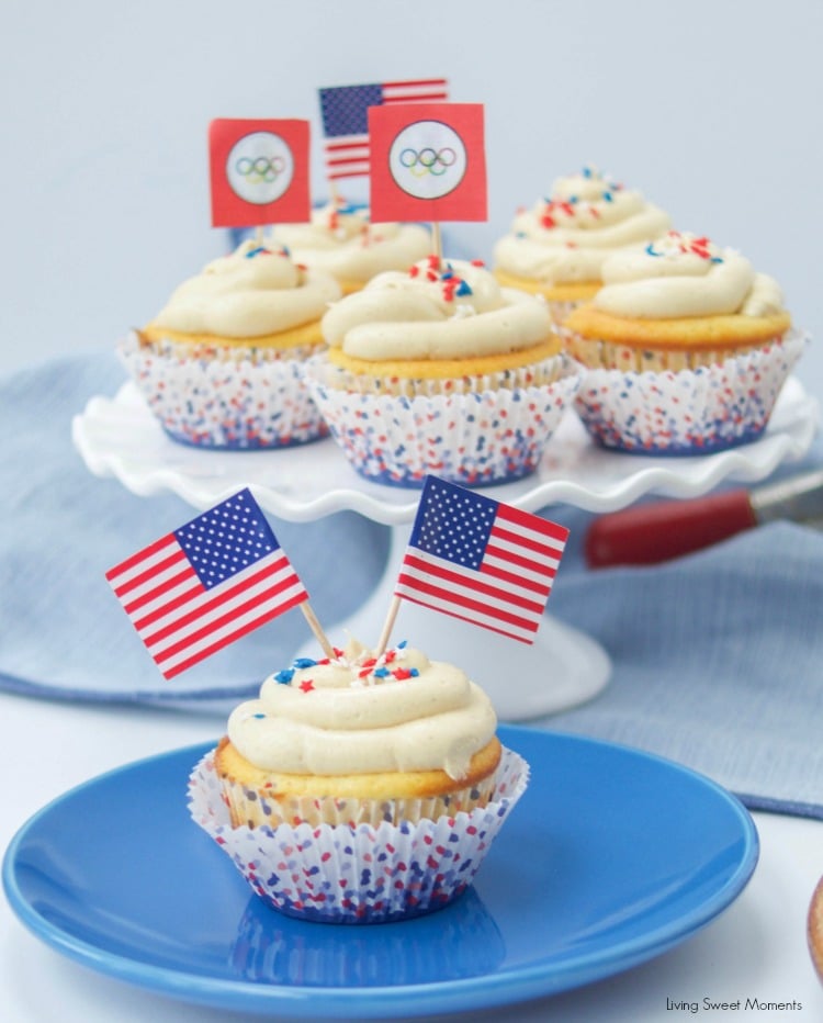 Peanut Butter And Jelly Cupcakes - delicious vanilla cupcakes filled with jelly and topped with peanut butter. The perfect dessert for any occasion.