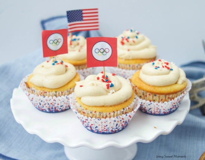 Peanut Butter And Jelly Cupcakes - delicious vanilla cupcakes filled with jelly and topped with peanut butter. The perfect dessert for any occasion.