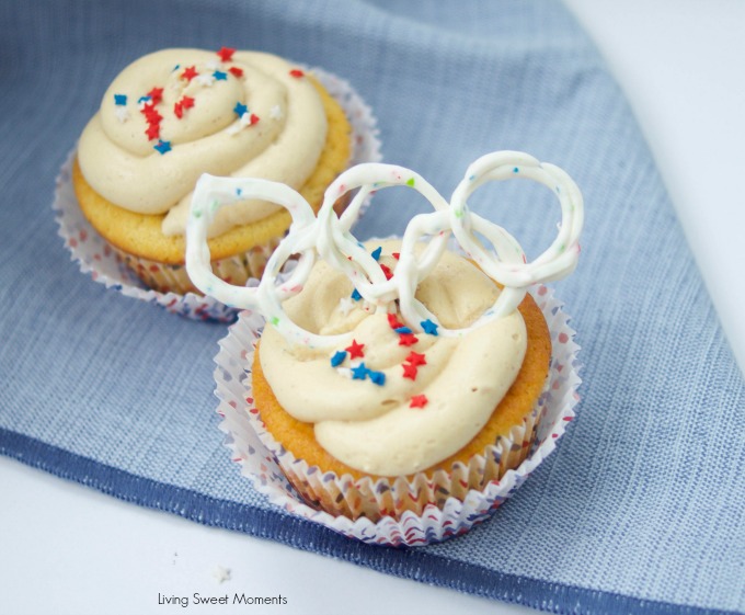 Peanut Butter And Jelly Cupcakes - delicious vanilla cupcakes filled with jelly and topped with peanut butter. The perfect dessert for any occasion.