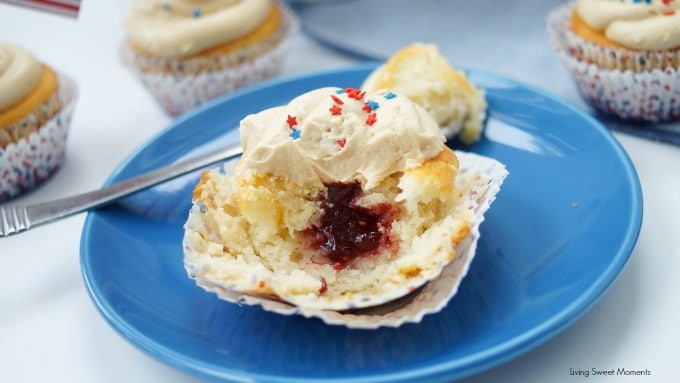 Peanut Butter And Jelly Cupcakes - delicious vanilla cupcakes filled with jelly and topped with peanut butter. The perfect dessert for any occasion.
