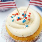 Peanut Butter And Jelly Cupcakes - delicious vanilla cupcakes filled with jelly and topped with peanut butter. The perfect dessert for any occasion.