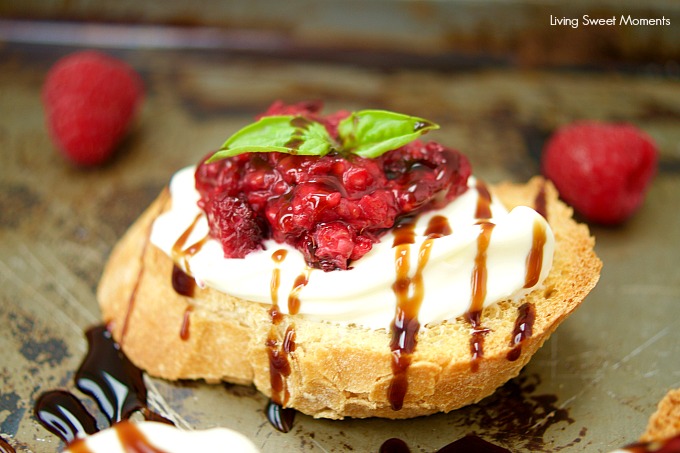 This delicious Roasted Raspberry Crostini recipe is made with balsamic vinegar, mascarpone cheese on top of a baguette. The perfect summer appetizer.