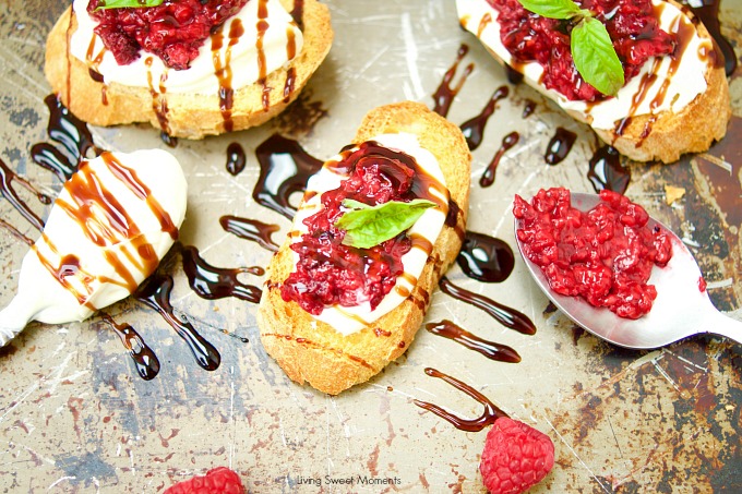 This delicious Roasted Raspberry Crostini recipe is made with balsamic vinegar, mascarpone cheese on top of a baguette. The perfect summer appetizer.