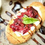 This delicious Roasted Raspberry Crostini recipe is made with balsamic vinegar, mascarpone cheese on top of a baguette. The perfect summer appetizer.