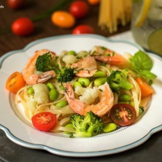 This delicious Summer Pasta is made with linguini, shrimp, and veggies and tossed in a butter garlic sauce. The perfect 15-minute dinner idea for the summer
