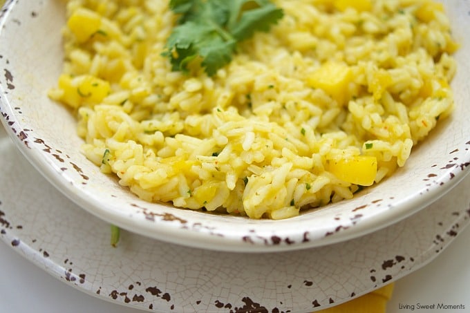 This Spicy Mango Rice recipe is easy to make and delicious. The perfect side dish to any dinner or for entertaining. Made with chili, cilantro, lime & mango