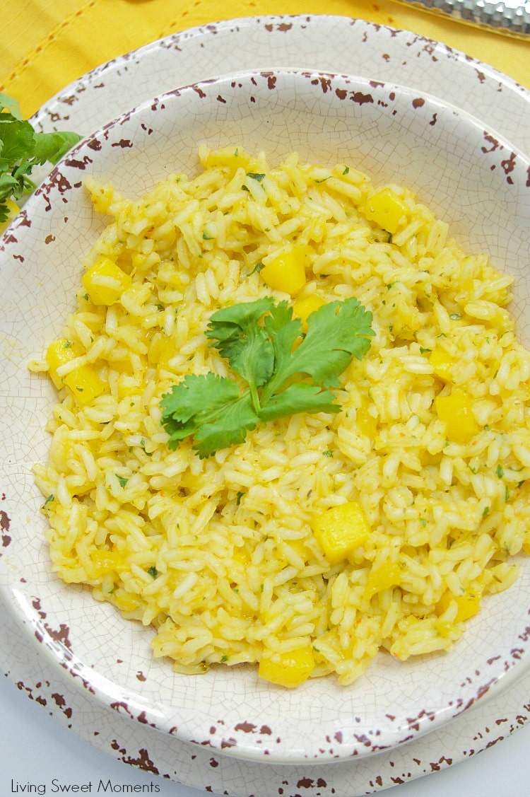 This Spicy Mango Rice recipe is easy to make and delicious. The perfect side dish to any dinner or for entertaining. Made with chili, cilantro, lime & mango