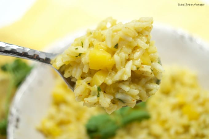 This Spicy Mango Rice recipe is easy to make and delicious. The perfect side dish to any dinner or for entertaining. Made with chili, cilantro, lime & mango