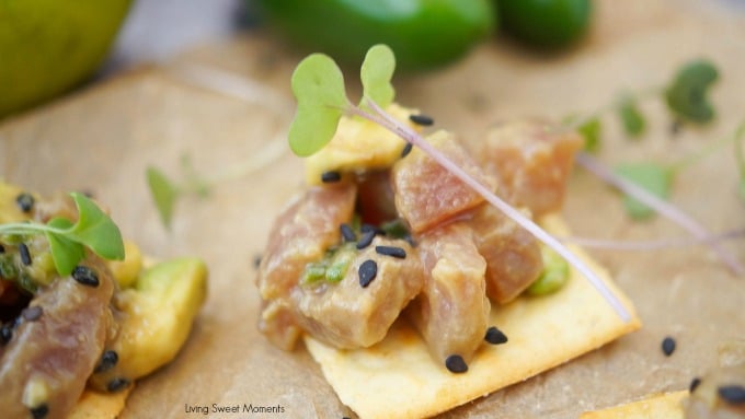 This delicious tuna tartare recipe is made with avocado and dressed in an Asian sauce. The perfect healthy appetizer served on top of a cracker. 