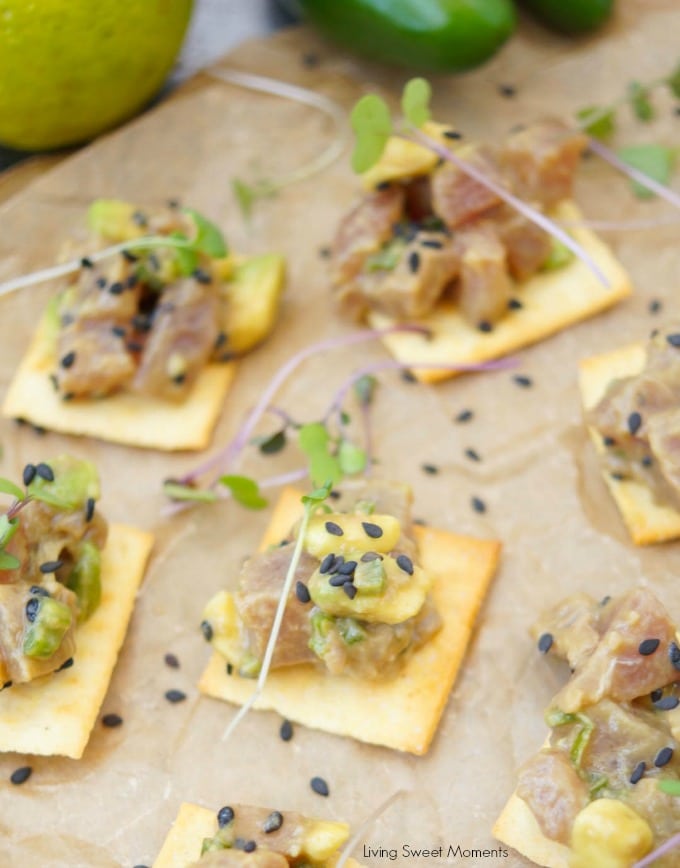 This delicious tuna tartare recipe is made with avocado and dressed in an Asian sauce. The perfect healthy appetizer served on top of a cracker. 