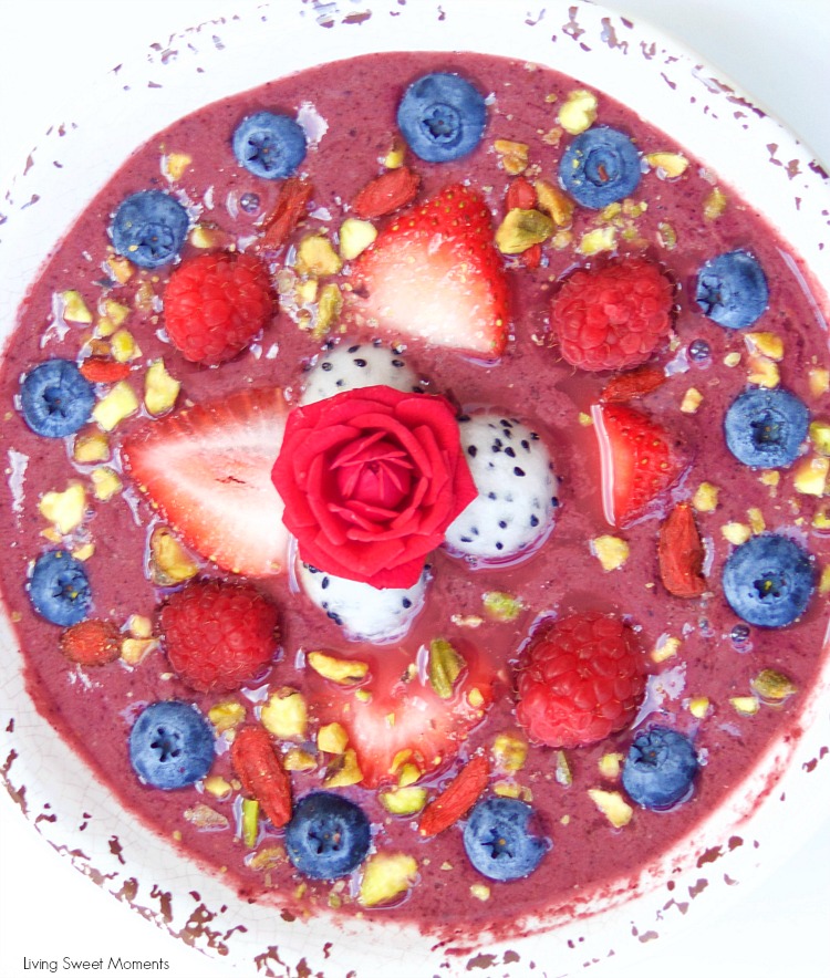 This delicious acai bowl recipe is blended with berries, dragonfruit, and yogurt. It's topped with fresh fruit and nuts. A healthy and quick breakfast idea.