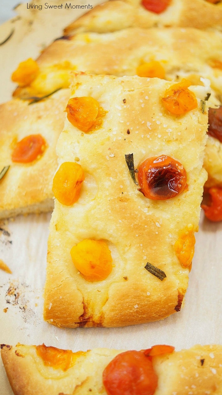 This delicious focaccia recipe is made under an hour and is flavored with cherry tomatoes and rosemary. It makes a wonderful appetizer to parties or dinners