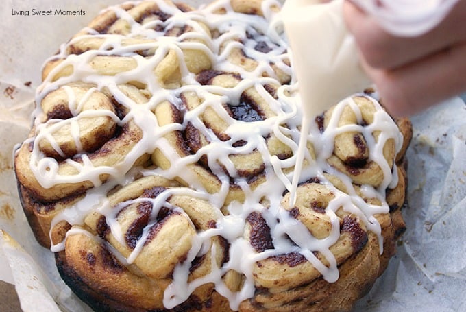 These fluffy Slow Cooker Cinnamon Rolls are made from scratch & baked right in the crockpot. Topped with a sweet vanilla icing. Ideal for breakfast & brunch