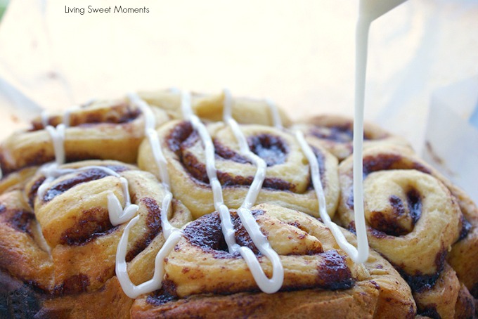 These fluffy Slow Cooker Cinnamon Rolls are made from scratch & baked right in the crockpot. Topped with a sweet vanilla icing. Ideal for breakfast & brunch