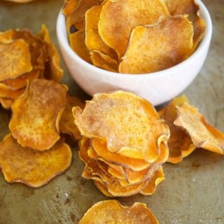 These crunchy Baked Sweet Potato Chips are oven baked to perfection and are great to snack on the go, especially in the lunchbox. It is also an easy recipe.