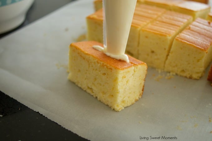 These scrumptious from scratch Lemon Snack Cakes are filled with lemon creme and topped with lemon frosting. Perfect recipe for dessert or the lunchbox.