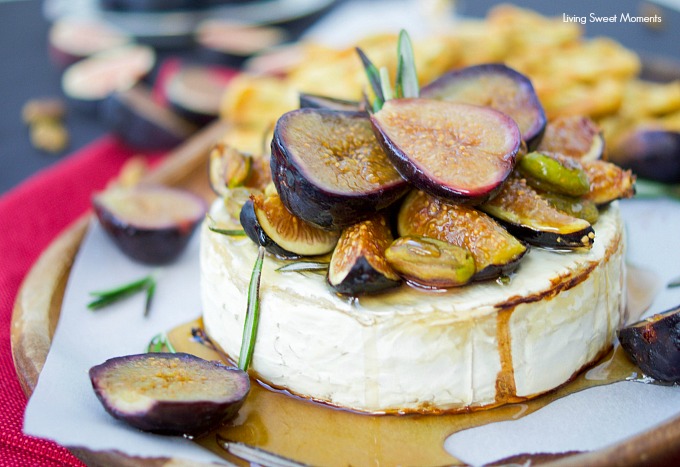 This delicious baked brie recipe is topped with roasted figs, honey, rosemary, and pistachios. The perfect easy appetizer that's ready in 25 minutes or less